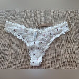 NWT SKIMS Ivory w/Cherry Dipped Lace Thong
Panty. Size 2X